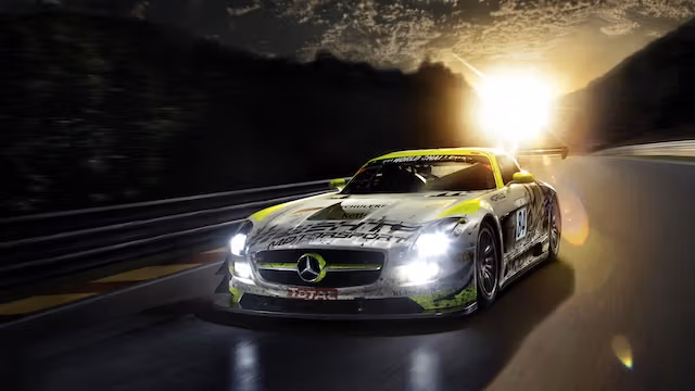 Mercedes-AMG GT racing car in front of a sunset