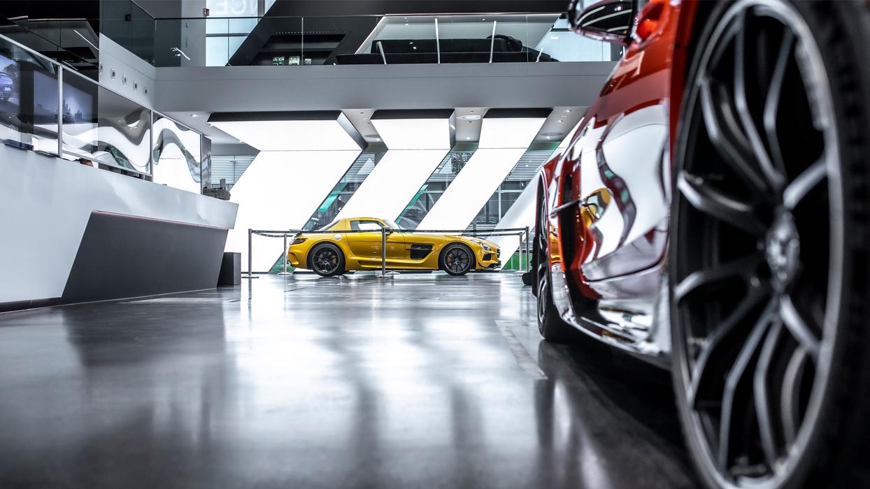 Foto from the Showroom in Affalterbach with red, and yellow AMG vehicles