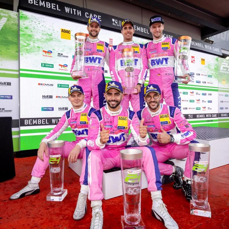 6 Mercedes-AMG GT drivers celebrating.