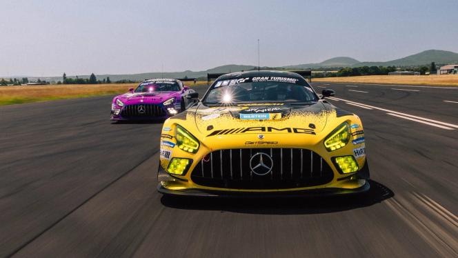 Several Mercedes-AMG GT Sport vehicles while driving on the race track