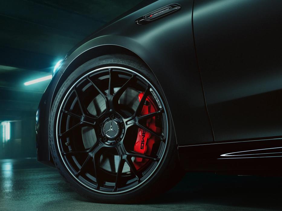 Close-up of a brake caliper in AMG red