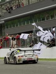 AMG GT racing car on the lap of honour around the pit lane