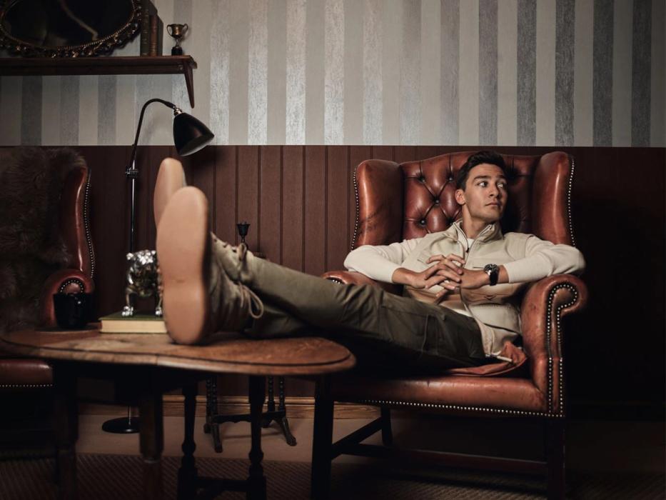 George Russel sitting on a chair