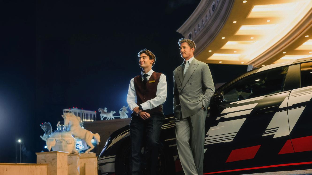 Brad Pitt and George Russle in front of the new Mercedes-AMG GT 4-Door Coupe prototype.