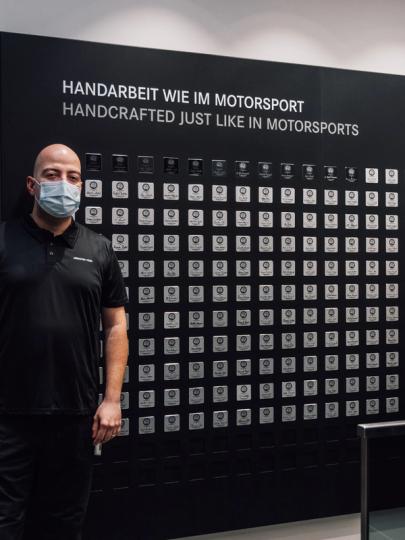 Black Series Employees in front of the black badges